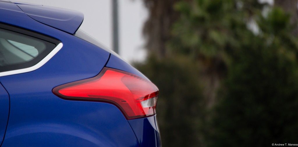 The tail end of a Dark Blue Ford Focus Hatchback